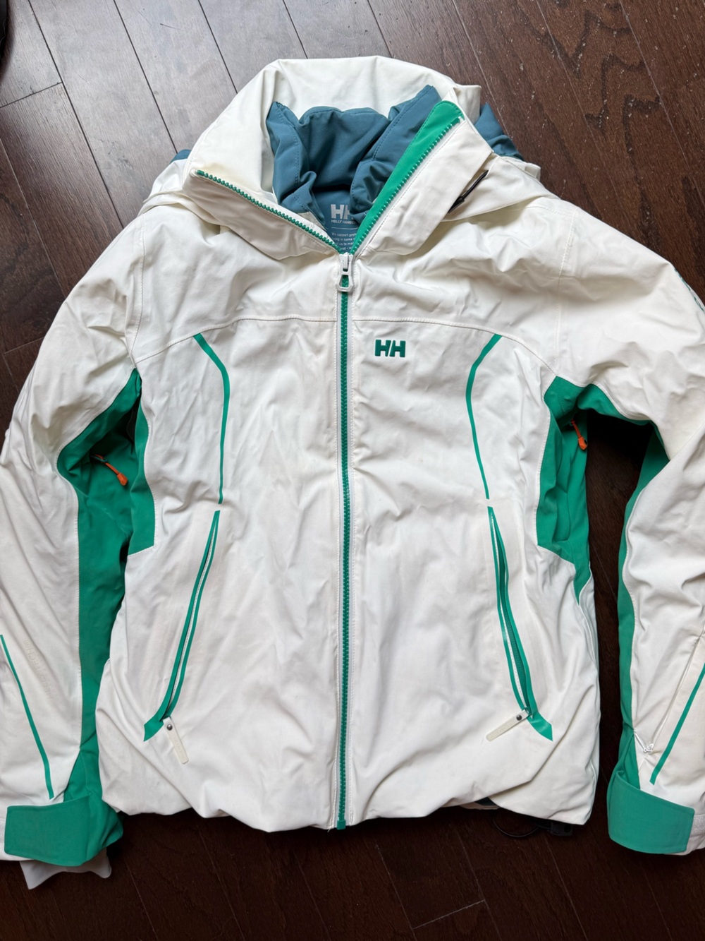 Helly Hansen Women’s White Ski Jacket with Teal Accents, Medium